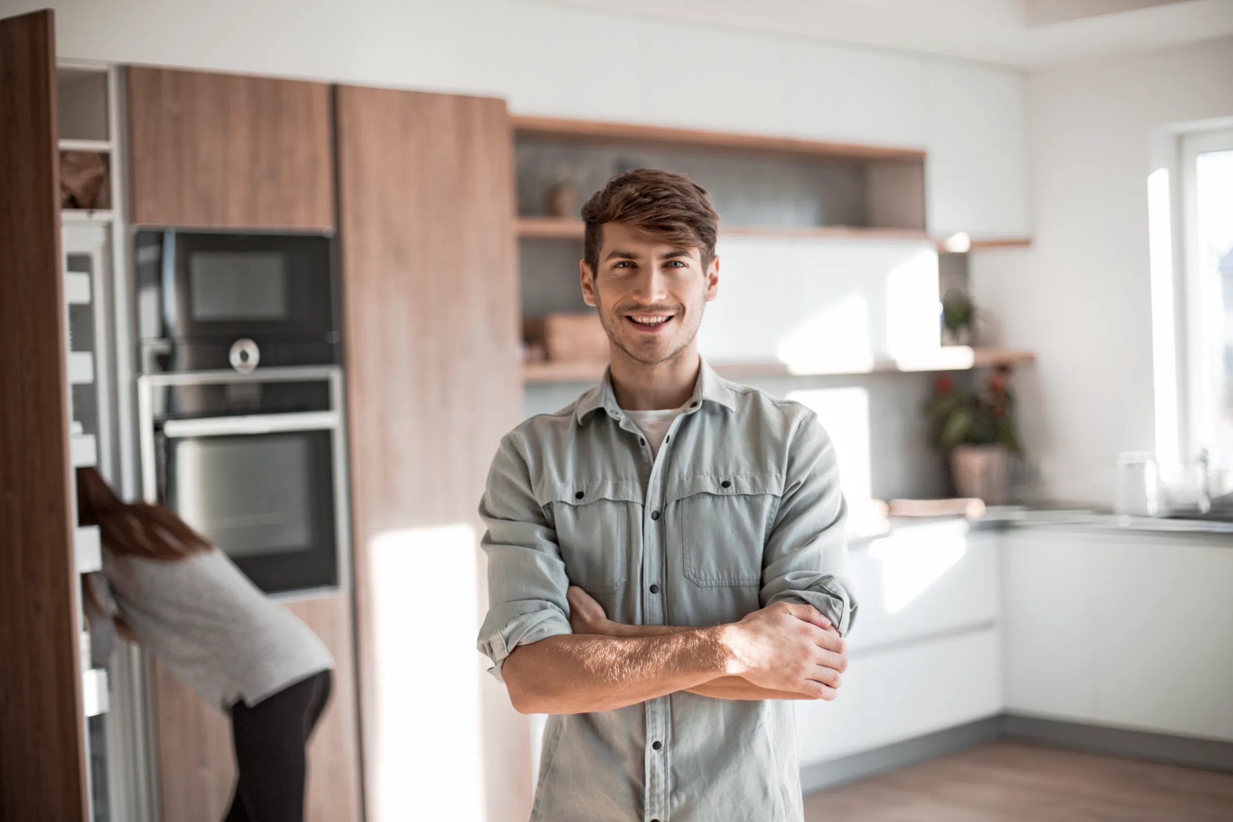 Man smiling in kitchen