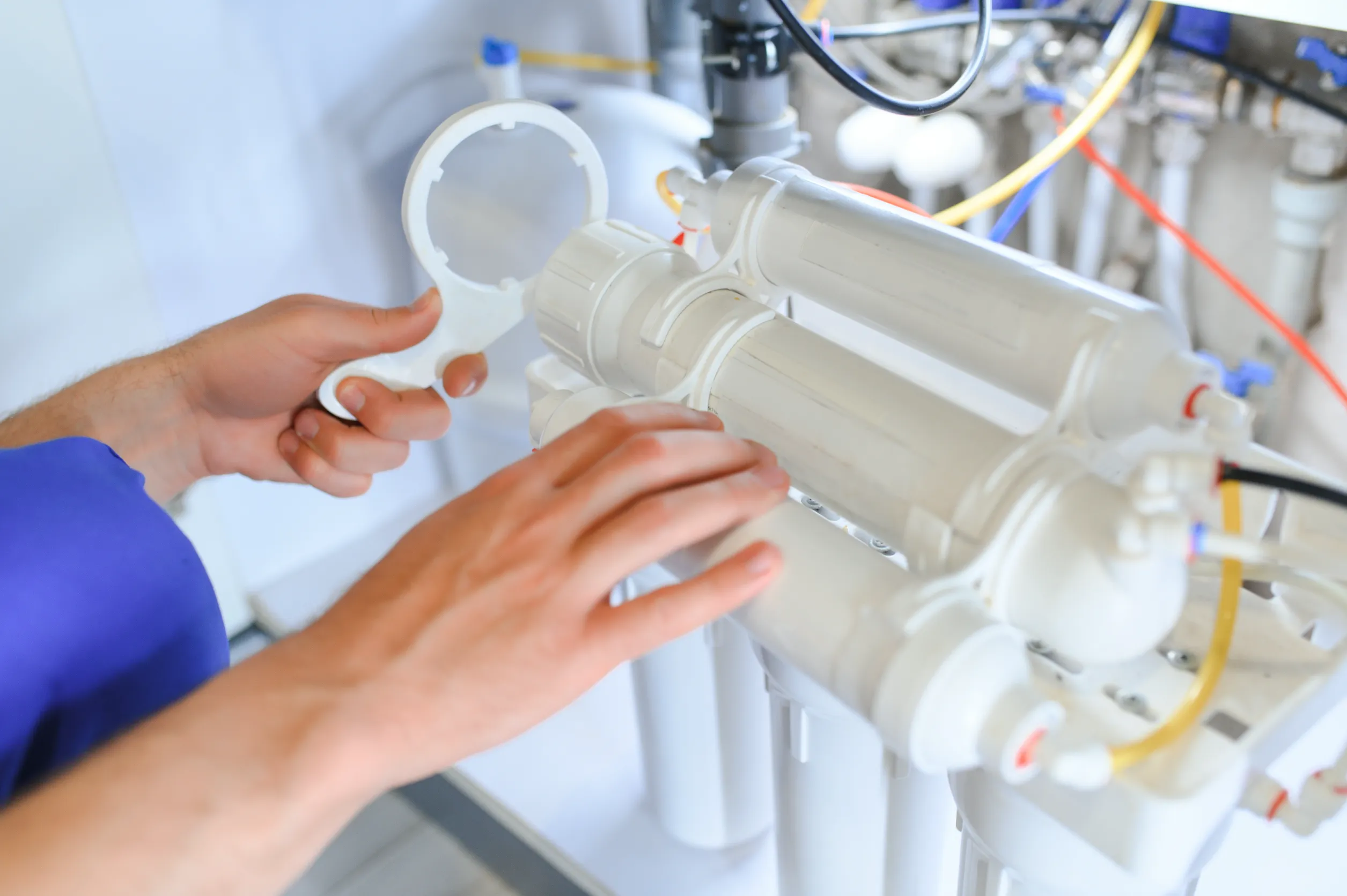 Person working on pipes