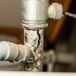 Bathroom pipe with leak
