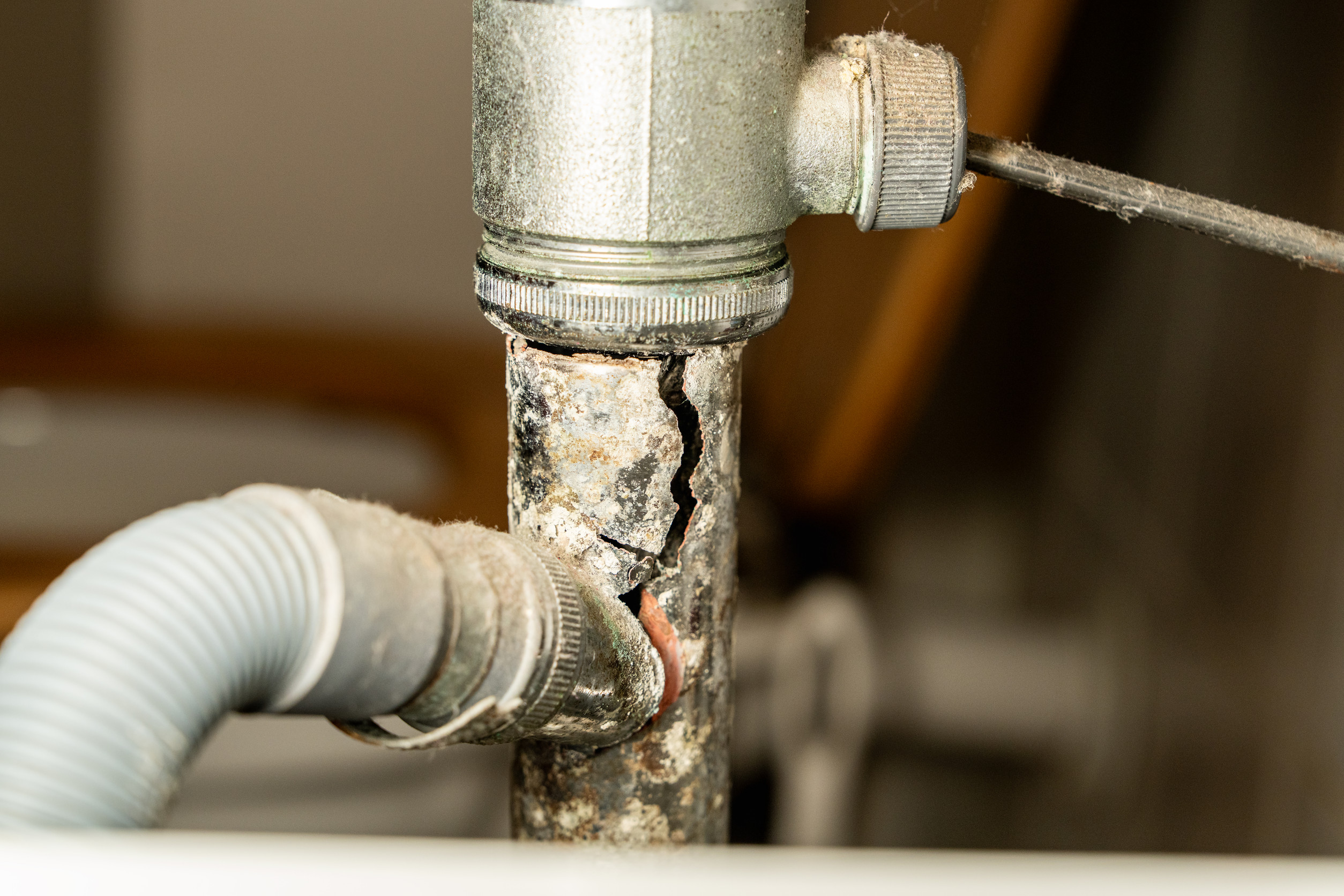 Bathroom pipe with leak